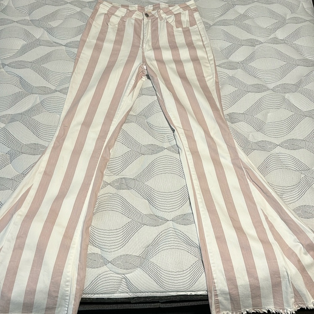 Women’s link and white stripped flare jeans